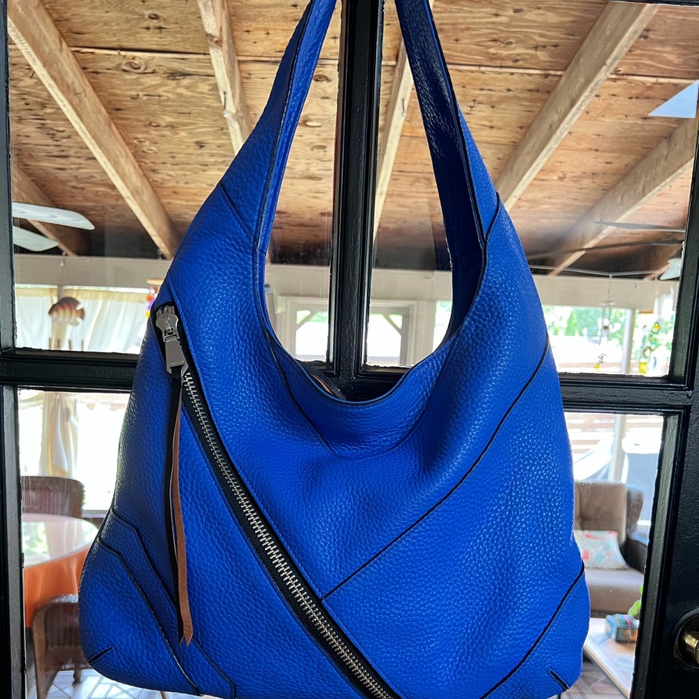 Cobalt blue Christopher Kon pebbled leather shoulder bag.